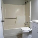 Bath Area, Toilet Seat, and Wash Basin in the Kitchen