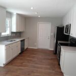 A Redone Kitchen with New Quartz Counters and Lights