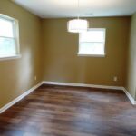 Painted Walls, New Floor, and Fan with Lights in the Bedroom