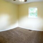 Yellow Color Paint on Walls and Illuminated Fan with Lights