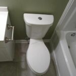 Bathtub, Toilet Seat, and Cabinet with Wash Basin