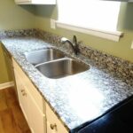 New Faucet, Two Compartments in Basin, and Concrete Platform