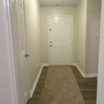 Closed Gates and Carpet on New Laminate Floor