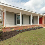 Newly Planted Flowers, Trimmed Grasses, and Beautiful Patio