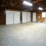 Empty Garage with the Property with Space for Two Cars