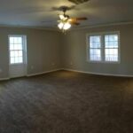 Master Bedroom View with New Flooring, New Paints on the Wall, and Windows