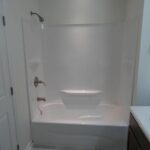 Newly Installed Bathtub and Shower with Running Water