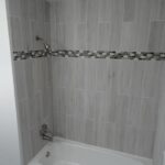 Second Bath with Bathtub, Shower, and Designer Tiles