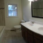 Interiors of the Second Bath Remodeled with All New Fixtures