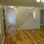 Hickory Woodwork on Steps and Floor with Lights on Ceiling