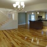 View of the Kitchen, Stairs, and Lots of Lit up Lights