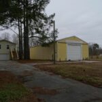 Two Garages, Big Trees, and Driveway for the House