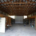 Interiors of the Garage at the Property with Tools and Things