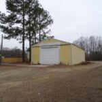 Big Trees, Garage, and Vegetation in the Back