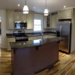 Granite Counter and Two Toned Cabinets in the Kitchen