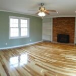 Real Hickory Wood Flooring and Fireplace in the Living Area