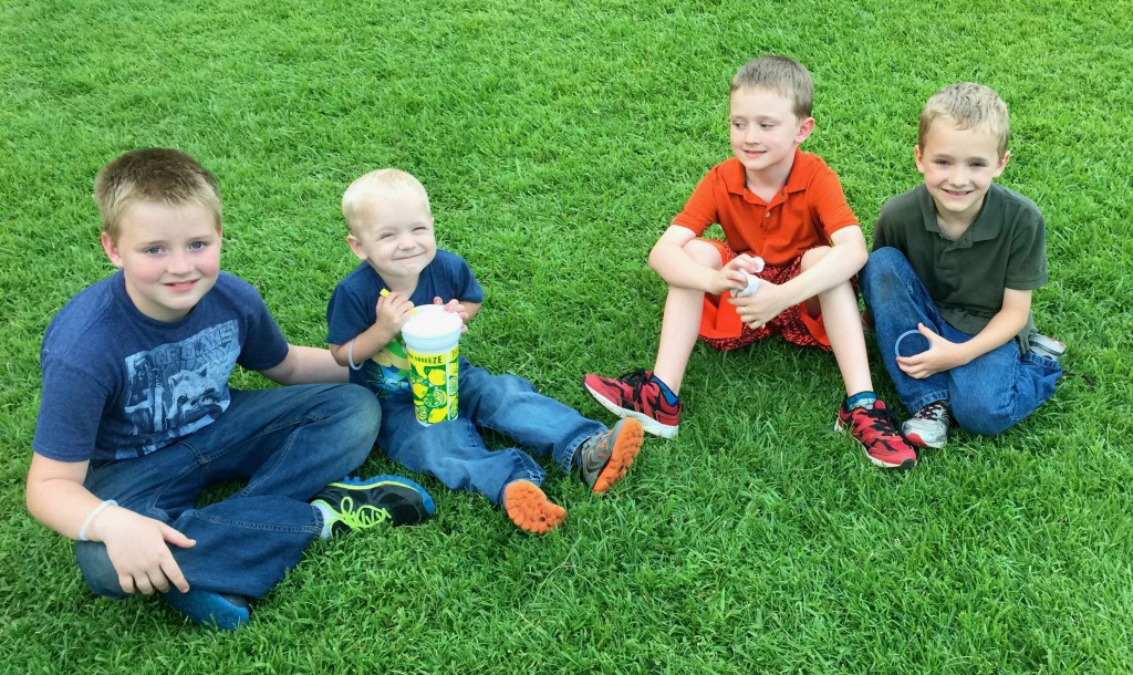 Four Kids enjoying Fun Moment on the Ground in Onslow County