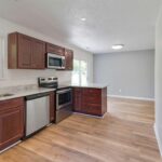 Brand New Kitchen with Granite Counters and Stainless Appliances