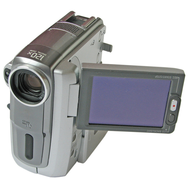 A Digital Camera with Recorder Open for Shoot