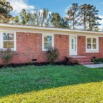 Red Brick Home with Large Area Outside with New Windows and Redo