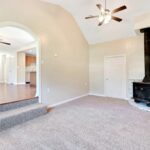 Fire Pit, Hallway Towards Living Room with New Flooring and Lights