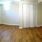 A Closed Redeveloped Room with Lights on and Cupboard Close