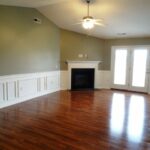 New Floor, Painted Walls, and Covered Fireplace