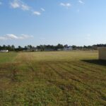 A Large Empty Land and Buildings in Some Distance