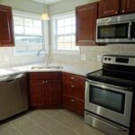 New Kitchen with Cabinets and Stainless Appliances