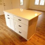 All New White Colored Island with Drawers for the Kitchen