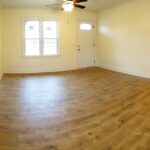 Living Room with New Floor and Advanced Lights On