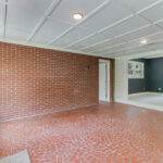 Spacious Living Area Redesigned with Tiles, Paint, and Lights