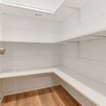 Spacious Storage Space Redesigned with Hardwood and Shelves