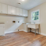 Fresh Painted Cabinets, Walls, and Hardwood Floor