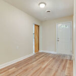 Hardwood Flooring, Gate, and Modern Lights on the Ceiling