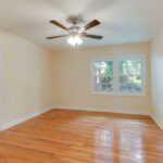 Hardwood Flooring for the Room and View of Kitchen