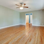 Long View of the Big Living Area with Hardwood Flooring