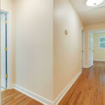 Hardwood in the Hallway with Lights and Fresh Paint