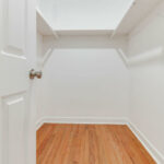 Real Hardwood for Flooring and White Painted Walls with Gate