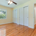 Newly Painted Walls, Windows, Lights, and Hardwood Flooring in the Home