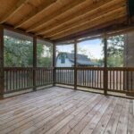 Beautiful Deck with a View of Fenced Shady Backyard