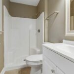 Bathroom Remodeled in White Color for Aesthetic Appeal