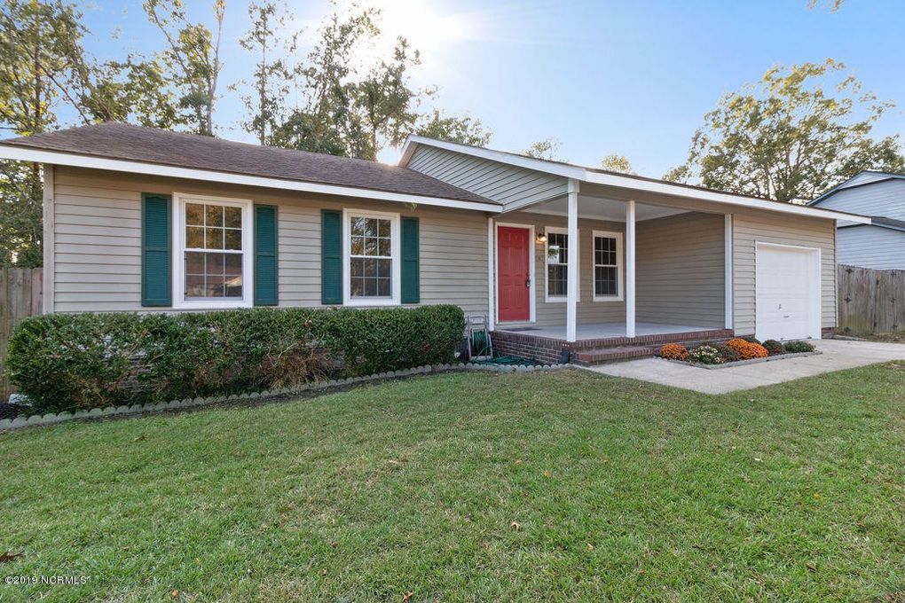 Trimmed Grass in the Front Yard of A Big House