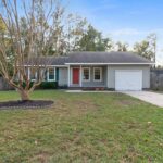 Beautified Tree in the Front of One Story Redesigned Home