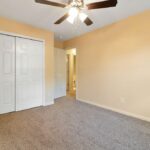 Fresh Painted Walls, Designer Fan, and Cupboard in the House