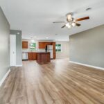 Long View of Walls, Floor, and Kitchen from Entry Gate