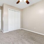 Remodeled Bedroom with Cupboard and Fan