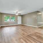 Remodeled Interiors of the Home with Lights on and Window View