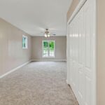 Shining Wall and Floor with View of Greenery from the Door